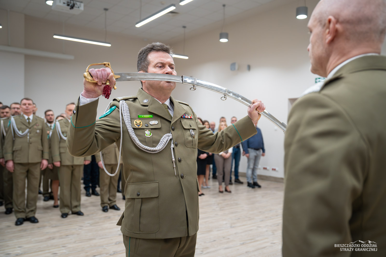 Obraz przedstawiający Pożegnanie zasłużonych funkcjonariuszy w BiOSG